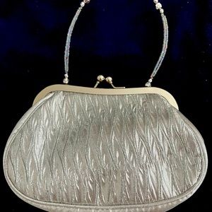 Small silver evening bag original or $25 selling price $15 new never used
